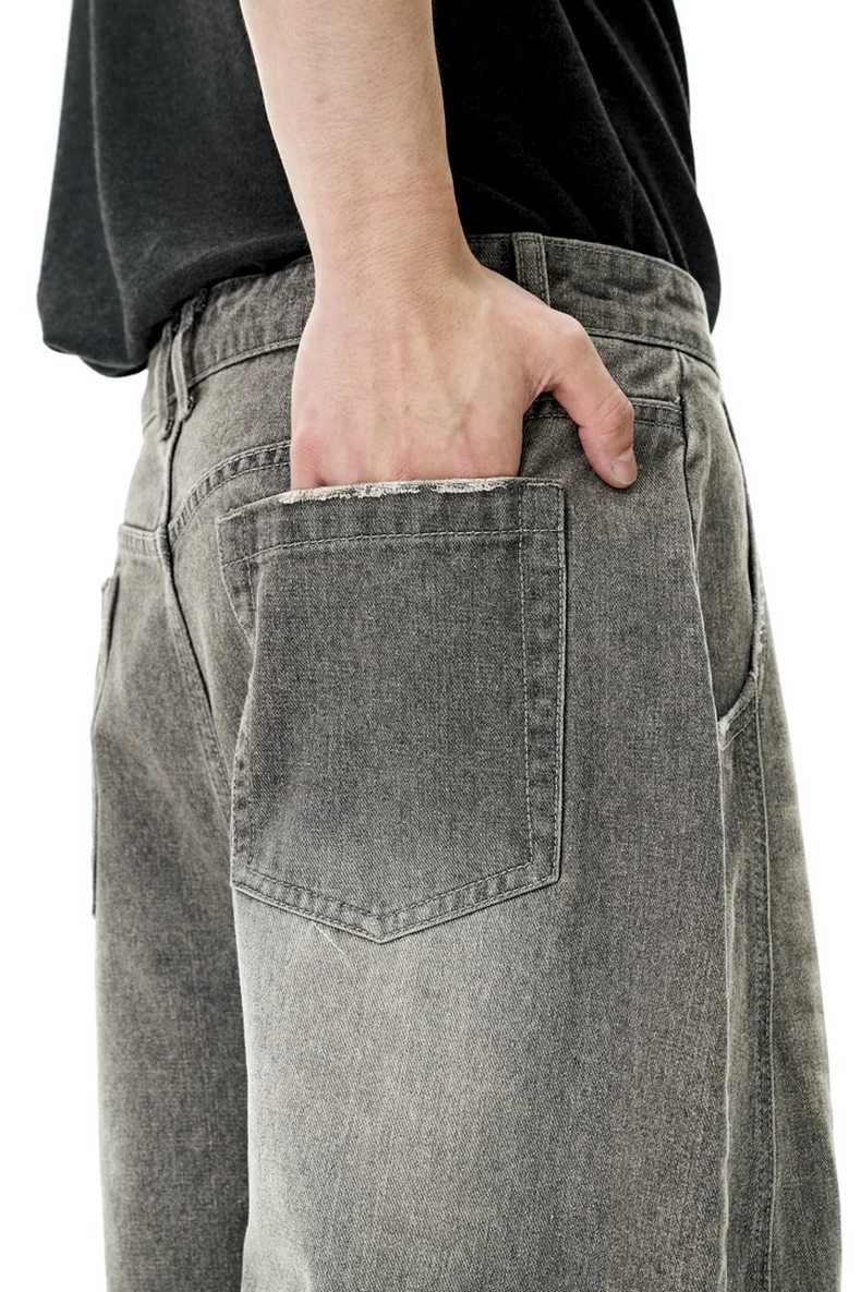 Washed Curved-Leg Denim Pants image 12